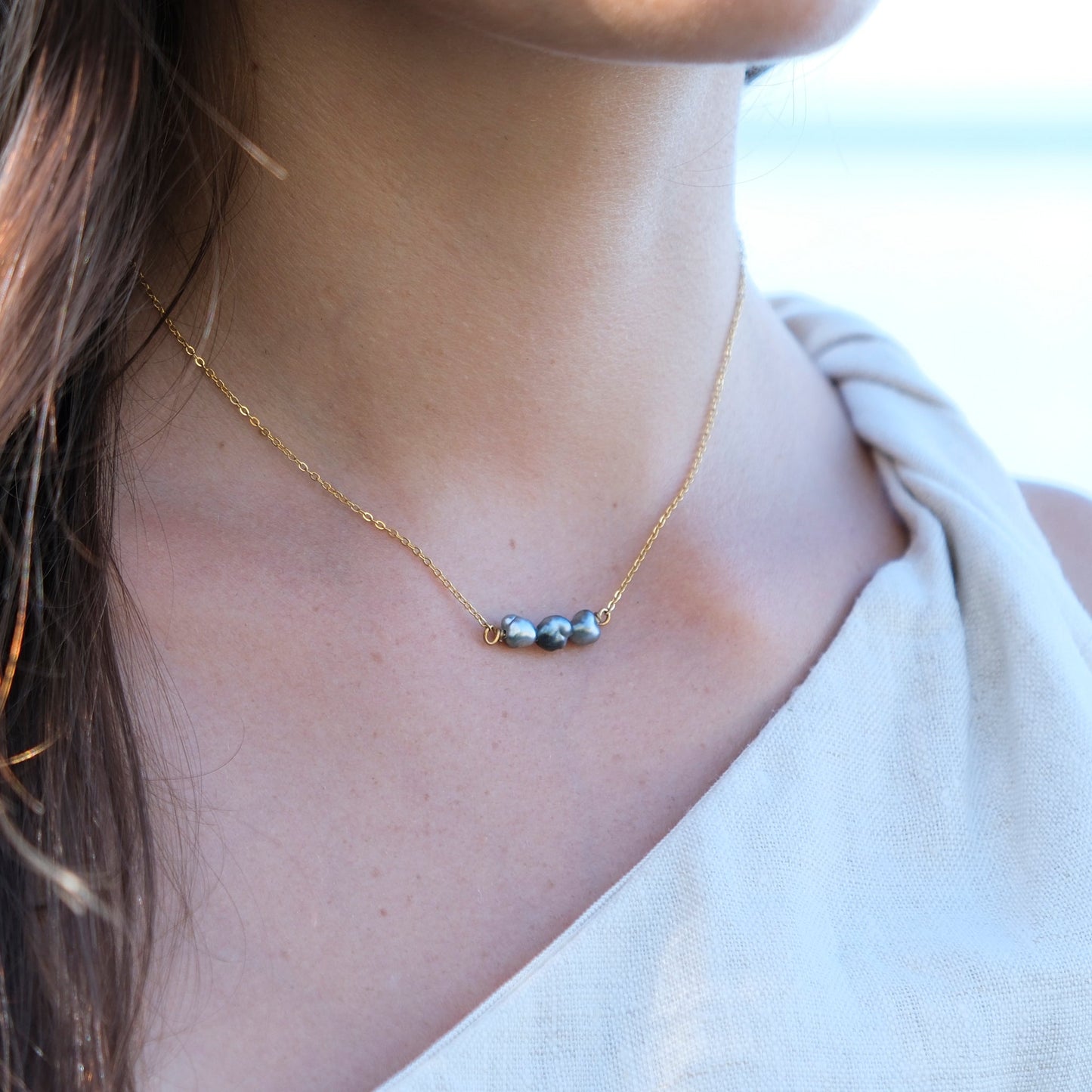Ras du cou Umoa en keshis de Tahiti ou d'eau douce. Bijoux en acier inoxydable doré
